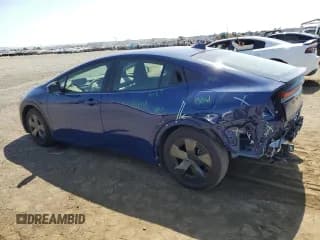 ✅ 2024 Toyota Prius LE • VIN: JTDACAAU4R3023005 • Lot: 60969314. Listed on Copart with 12,015 mi. Free auction sales archive from the USA and detailed vehicle history report at DreamBid. Image 2.