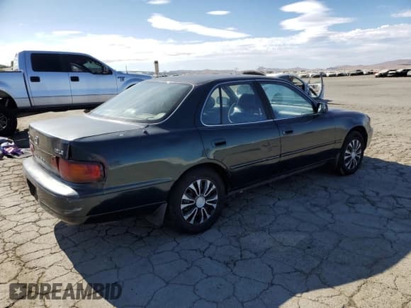 ✅ 1995 Toyota Camry LE • VIN: JT2GK12E3S0117364 • Lot: 65818255. Wystawiony na Copart z przebiegiem 215 464 mil. Bezpłatny archiwum sprzedaży aukcyjnych z USA i szczegółowy raport historii pojazdu na DreamBid. Zdjęcie 3.