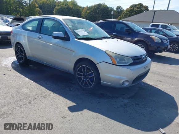 ✅ 2010 Ford Focus SES • VIN: 1FAHP3DN7AW129122 • Lot: 43532341. Listed on IAAI with 170,234 mi. Free auction sales archive from the USA and detailed vehicle history report at DreamBid. Image 1.