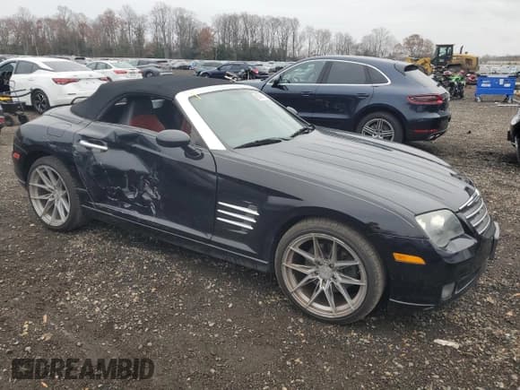 ✅ 2005 Chrysler Crossfire Limited • VIN: 1C3AN65L95X049647 • Lot: 93609175. Listed on Copart with 153,545 mi. Free auction sales archive from the USA and detailed vehicle history report at DreamBid. Image 4.