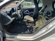 ✅ 2014 Smart fortwo Pure • VIN: WMEEJ3BA8EK733193 • Lot: 62123245. Listed on Copart with Not provided. Free auction sales archive from the USA and detailed vehicle history report at DreamBid. Image 7.