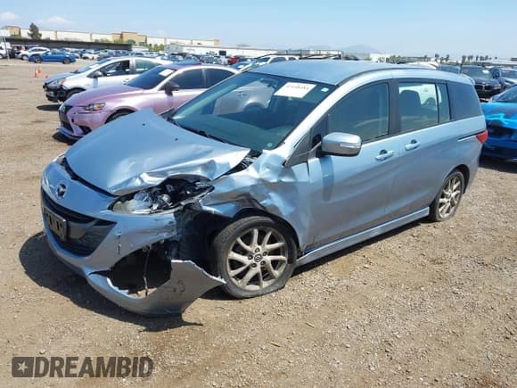 ✅ 2013 Mazda 5 Touring • VIN: JM1CW2CL8D0145628 • Lot: 42148184. Listed on IAAI with 137,150 mi. Free auction sales archive from the USA and detailed vehicle history report at DreamBid. Image 17.