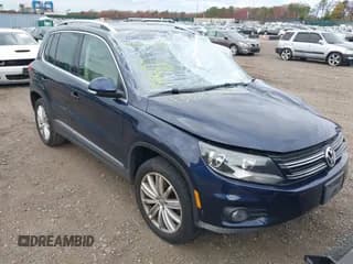 ✅ 2014 Volkswagen Tiguan S • VIN: WVGBV3AXXEW502280 • Lot: 43683048. Listed on IAAI with 94,528 mi. Free auction sales archive from the USA and detailed vehicle history report at DreamBid. Image 1.
