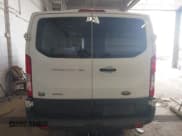 ✅ 2015 Ford Transit Cargo • VIN: 1FTNE1YG9FKB08497 • Lot: 42106682. Listed on IAAI with 158,992 mi. Free auction sales archive from the USA and detailed vehicle history report at DreamBid. Image 16.