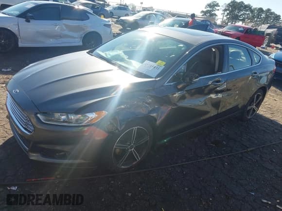 ✅ 2016 Ford Fusion Titanium • VIN: 3FA6P0K96GR140023 • Lot: 43714831. Listed on IAAI with 144,663 mi. Free auction sales archive from the USA and detailed vehicle history report at DreamBid. Image 2.