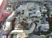 ✅ 2004 Ford Mustang Deluxe • VIN: 1FAFP444X4F126207 • Лот: 85910694. Опубликован ранее на Copart с пробегом 130 524 миль. Бесплатный доступ к архиву аукционных продаж из США и подробный отчёт об истории автомобиля на DreamBid. Изображение 14.