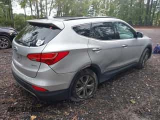 2014 Hyundai Santa Fe z VIN 5XYZU3LB1EG216564, wystawiony jako IAAI lot #43447327 z przebiegiem 162 734 mil mil oraz . Historia ofert i sprzedaży dostępna na DreamBid. Obrazek 4.