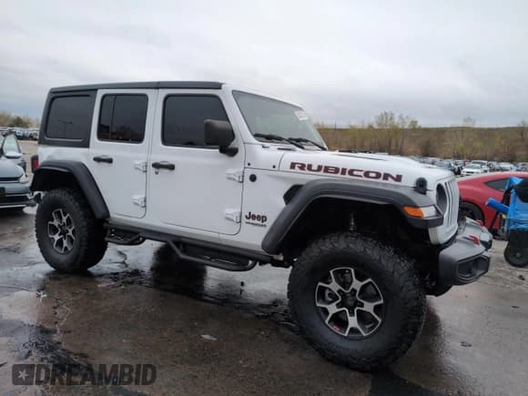 ✅ 2020 Jeep Wrangler Unlimited Rubicon • VIN: 1C4HJXFN1LW335751 • Лот: 54242215. Опубликован ранее на Copart с пробегом 74 961 миль. Бесплатный доступ к архиву аукционных продаж из США и подробный отчёт об истории автомобиля на DreamBid. Изображение 4.