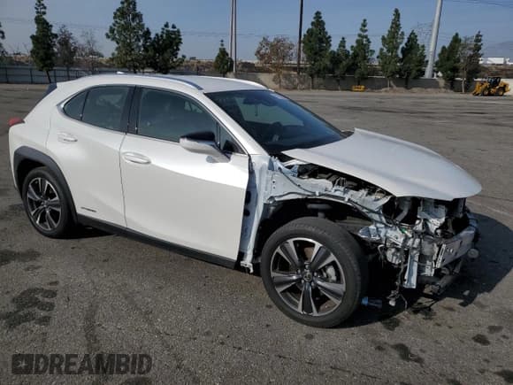 ✅ 2022 Lexus UX 250h • VIN: JTHX9JBH2N2056285 • Lot: 87221214. Listed on Copart with 33,377 mi. Free auction sales archive from the USA and detailed vehicle history report at DreamBid. Image 4.