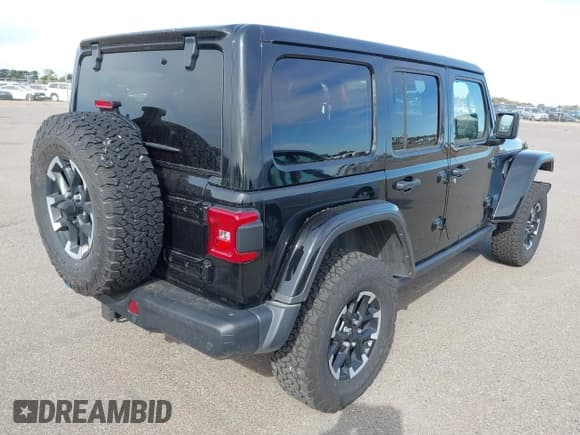✅ 2024 Jeep Wrangler Rubicon X • VIN: 1C4RJXR66RW249966 • Lot: 43380775. Listed on IAAI with 11,998 mi. Free auction sales archive from the USA and detailed vehicle history report at DreamBid. Image 4.