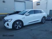 ✅ 2024 Audi Q8 e-tron Premium • VIN: WA14AAGE5RB015871 • Лот: 82716414. Опубликован ранее на Copart с пробегом 10 032 миль. Бесплатный доступ к архиву аукционных продаж из США и подробный отчёт об истории автомобиля на DreamBid. Изображение 1.