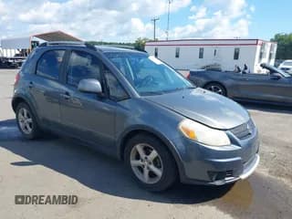 ✅ 2009 Suzuki SX4 Touring AWD • VIN: JS2YB417996201993 • Lot: 43041642. Wystawiony na IAAI z przebiegiem 115 051 mil. Bezpłatny archiwum sprzedaży aukcyjnych z USA i szczegółowy raport historii pojazdu na DreamBid. Zdjęcie 1.