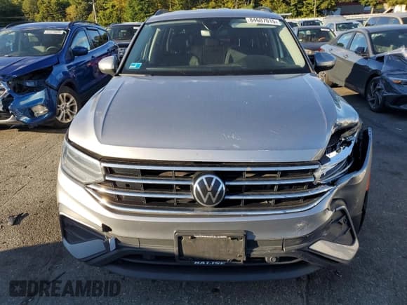 ✅ 2022 Volkswagen Tiguan S • VIN: 3VV0B7AX4NM041378 • Lot: 84607015. Listed on Copart with 95,305 mi. Free auction sales archive from the USA and detailed vehicle history report at DreamBid. Image 5.