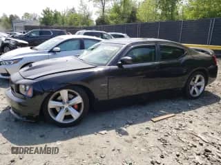 2009 Dodge Charger SRT-8 с VIN 2B3LA73W39H597691, выставлен на аукционе Copart как лот 55094195 с пробегом 156 283 миль миль и Списание • Salvage title. История ставок и продаж доступна на DreamBid. Изображение 1.