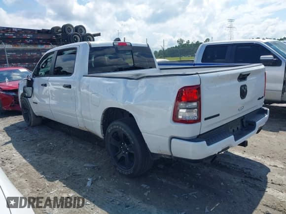 ✅ 2023 Ram 1500 Lone Star • VIN: 1C6SRFMT5PN599519 • Lot: 42921193. Listed on IAAI with 153,168 mi. Free auction sales archive from the USA and detailed vehicle history report at DreamBid. Image 3.