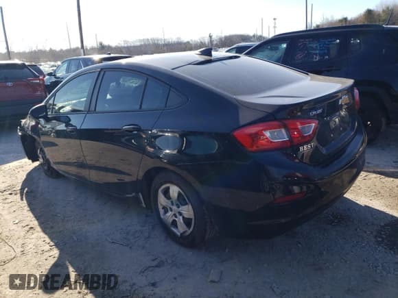 ✅ 2018 Chevrolet Cruze LS • VIN: 1G1BC5SM0J7180644 • Lot: 38956783. Listed on Copart with 49,748 mi. Free auction sales archive from the USA and detailed vehicle history report at DreamBid. Image 2.