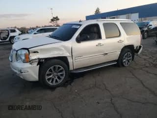 ✅ 2011 GMC Yukon Denali • VIN: 1GKS2EEF9BR189859 • Lot: 80338085. Listed on Copart with 275,661 mi. Free auction sales archive from the USA and detailed vehicle history report at DreamBid. Image 1.