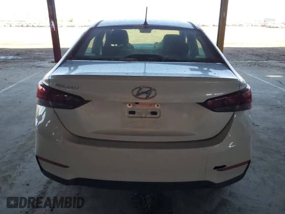 2022 Hyundai Accent SEL z VIN 3KPC24A64NE174623, wystawiony jako Copart lot #52722574 z przebiegiem 18 123 mil mil oraz Szkoda całkowita • Salvage title. Historia ofert i sprzedaży dostępna na DreamBid. Obrazek 6.