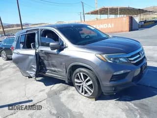 ✅ 2017 Honda Pilot EX-L • VIN: 5FNYF5H55HB017064 • Lot: 43348054. Listed on IAAI with 152,893 mi. Free auction sales archive from the USA and detailed vehicle history report at DreamBid. Image 1.