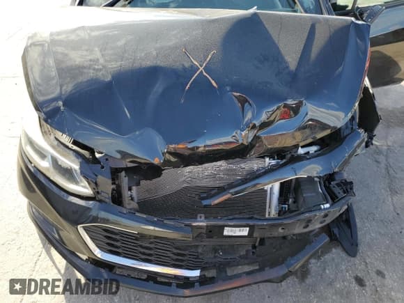 ✅ 2018 Chevrolet Cruze LS • VIN: 1G1BC5SM5J7171101 • Lot: 40264313. Listed on Copart with 32,868 mi. Free auction sales archive from the USA and detailed vehicle history report at DreamBid. Image 12.