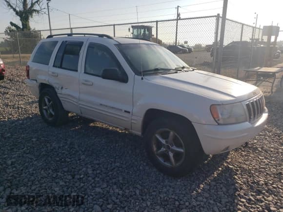 ✅ 2002 Jeep Grand Cherokee Limited • VIN: 1J4GW58N82C311682 • Lot: 68246545. Listed on Copart with 163,108 mi. Free auction sales archive from the USA and detailed vehicle history report at DreamBid. Image 4.