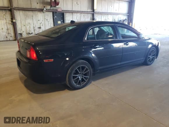 ✅ 2012 Chevrolet Malibu 1LS • VIN: 1G1ZB5E0XCF102133 • Lot: 70023344. Listed on Copart with 196,770 mi. Free auction sales archive from the USA and detailed vehicle history report at DreamBid. Image 3.