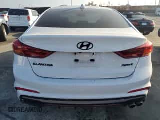 2018 Hyundai Elantra Sport z VIN KMHD04LB9JU704015, wystawiony jako Copart lot #90088295 z przebiegiem Nie podano mil oraz Nie do naprawy • Non repairable. Historia ofert i sprzedaży dostępna na DreamBid. Obrazek 6.