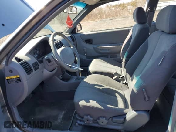 2005 Hyundai Accent GLS с VIN KMHCG35C65U331867, выставлен на аукционе Copart как лот 49637495 с пробегом 63 901 миль миль и Чистый • Clean title. История ставок и продаж доступна на DreamBid. Изображение 7.