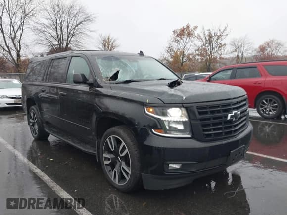 ✅ 2018 Chevrolet Suburban Premier • VIN: 1GNSKJKC7JR184079 • Lot: 43567552. Listed on IAAI with 84,957 mi. Free auction sales archive from the USA and detailed vehicle history report at DreamBid. Image 1.