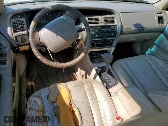 ✅ 1998 Toyota Avalon XL • VIN: 4T1BF18B1WU229710 • Lot: 81160325. Listed on Copart with 276,685 mi. Free auction sales archive from the USA and detailed vehicle history report at DreamBid. Image 8.