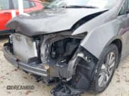 ✅ 2014 Honda Odyssey Touring • VIN: 5FNRL5H94EB128801 • Lot: 43754257. Listed on IAAI with 177,119 mi. Free auction sales archive from the USA and detailed vehicle history report at DreamBid. Image 6.