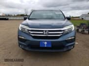 ✅ 2017 Honda Pilot EX-L • VIN: 5FNYF6H72HB023699 • Lot: 82439425. Listed on Copart with 63,725 mi. Free auction sales archive from the USA and detailed vehicle history report at DreamBid. Image 5.