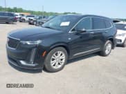 ✅ 2023 Cadillac XT6 AWD Luxury • VIN: 1GYKPBR49PZ169939 • Lot: 42424555. Listed on IAAI with 55,461 mi. Free auction sales archive from the USA and detailed vehicle history report at DreamBid. Image 2.