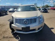 ✅ 2015 Cadillac SRX Premium Collection • VIN: 3GYFNGE38FS547147 • Lot: 70882935. Wystawiony na Copart z przebiegiem 160 153 mil. Bezpłatny archiwum sprzedaży aukcyjnych z USA i szczegółowy raport historii pojazdu na DreamBid. Zdjęcie 5.