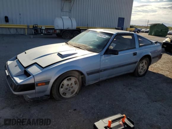 ✅ 1984 Nissan 300ZX • VIN: JN1CZ14S8EX017280 • Lot: 85945215. Listed on Copart with 107,512 mi. Free auction sales archive from the USA and detailed vehicle history report at DreamBid. Image 1.