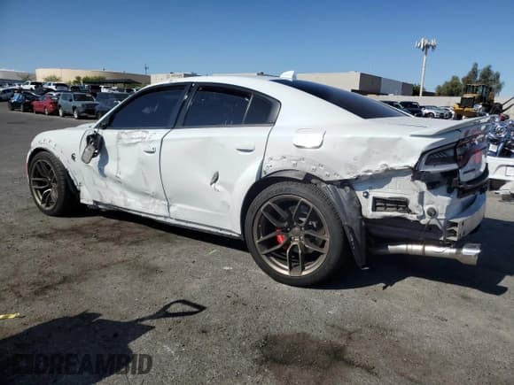 ✅ 2021 Dodge Charger SRT Hellcat Widebody • VIN: 2C3CDXL91MH592728 • Лот: 54773065. Опубликован ранее на Copart с пробегом 27 136 миль. Бесплатный доступ к архиву аукционных продаж из США и подробный отчёт об истории автомобиля на DreamBid. Изображение 2.