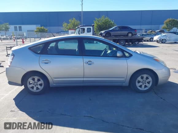 ✅ 2005 Toyota Prius • VIN: JTDKB20U353036014 • Lot: 43736103. Listed on IAAI with 122,145 mi. Free auction sales archive from the USA and detailed vehicle history report at DreamBid. Image 13.