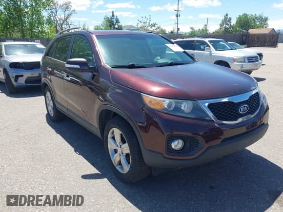 ✅ 2013 Kia Sorento EX • VIN: 5XYKU4A65DG367757 • Lot: 42283593. Listed on IAAI with 122,779 mi. Free auction sales archive from the USA and detailed vehicle history report at DreamBid. Image 1.