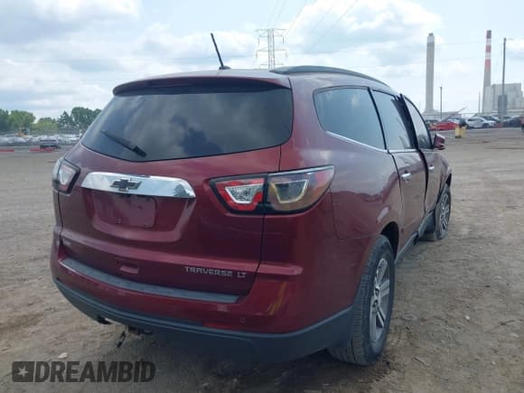 ✅ 2015 Chevrolet Traverse LT • VIN: 1GNKRHKD4FJ194880 • Lot: 43018808. Listed on IAAI with 200,707 mi. Free auction sales archive from the USA and detailed vehicle history report at DreamBid. Image 4.