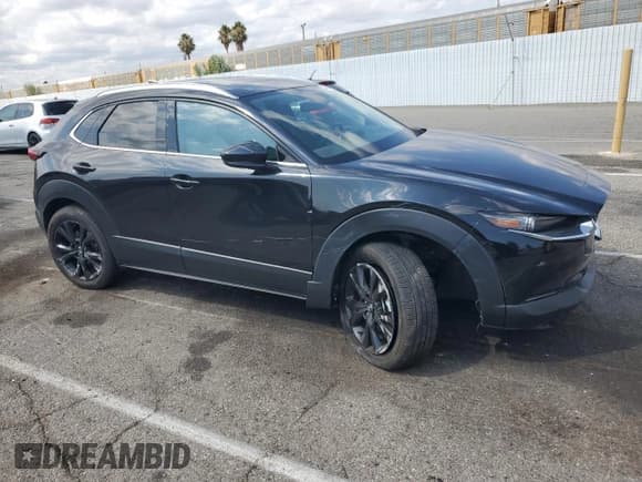✅ 2023 Mazda CX-30 Premium • VIN: 3MVDMBDY2PM503035 • Lot: 80368565. Wystawiony na Copart z przebiegiem 51 174 mil. Bezpłatny archiwum sprzedaży aukcyjnych z USA i szczegółowy raport historii pojazdu na DreamBid. Zdjęcie 4.