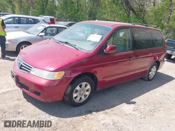 ✅ 2004 Honda Odyssey EX-RES • VIN: 5FNRL18814B099854 • Lot: 42123484. Listed on IAAI with 206,018 mi. Free auction sales archive from the USA and detailed vehicle history report at DreamBid. Image 2.