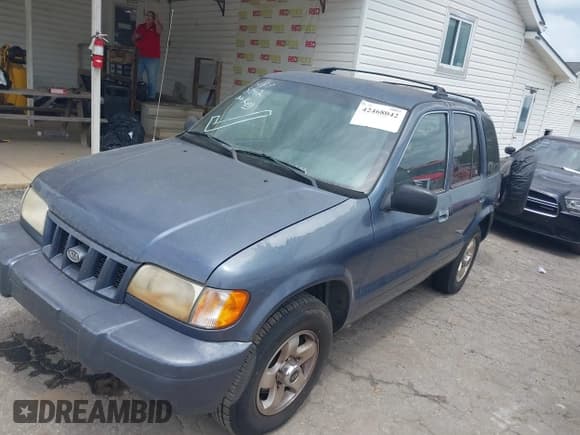 ✅ 2002 Kia Sportage • VIN: KNDJB723525162145 • Лот: 42468042. Опубликован ранее на IAAI с пробегом 208 697 миль. Бесплатный доступ к архиву аукционных продаж из США и подробный отчёт об истории автомобиля на DreamBid. Изображение 2.