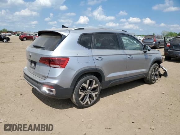 ✅ 2023 Volkswagen Taos SEL • VIN: 3VV2X7B27PM306374 • Lot: 56562885. Listed on Copart with 13,677 mi. Free auction sales archive from the USA and detailed vehicle history report at DreamBid. Image 3.