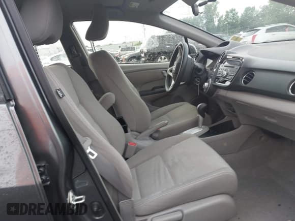 ✅ 2014 Honda Insight LX • VIN: JHMZE2H54ES000081 • Lot: 42622054. Listed on IAAI with 30,097 mi. Free auction sales archive from the USA and detailed vehicle history report at DreamBid. Image 5.