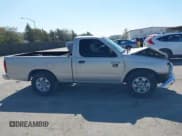 ✅ 1999 Nissan Frontier XE • VIN: 1N6DD21S4XC303399 • Лот: 41646121. Опубликован ранее на IAAI с пробегом 164 064 миль. Бесплатный доступ к архиву аукционных продаж из США и подробный отчёт об истории автомобиля на DreamBid. Изображение 13.