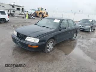 ✅ 1997 Toyota Avalon XL • VIN: 4T1BF12B6VU167311 • Лот: 43733232. Опубликован ранее на IAAI с пробегом 155 686 миль. Бесплатный доступ к архиву аукционных продаж из США и подробный отчёт об истории автомобиля на DreamBid. Изображение 2.