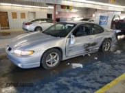 ✅ 1999 Pontiac Grand Prix GTP • VIN: 1G2WR1211XF262889 • Лот: 89019755. Опубликован ранее на Copart с пробегом 163 429 миль. Бесплатный доступ к архиву аукционных продаж из США и подробный отчёт об истории автомобиля на DreamBid. Изображение 1.
