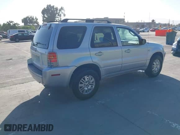 2006 Mercury Mariner Luxury z VIN 4M2YU56196DJ05801, wystawiony jako IAAI lot #42528336 z przebiegiem 162 851 mil mil oraz . Historia ofert i sprzedaży dostępna na DreamBid. Obrazek 4.