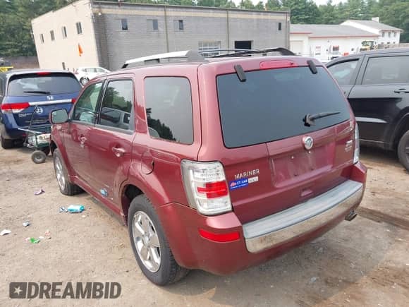 2010 Mercury Mariner Premier with VIN 4M2CN9HG2AKJ12271, listed as a IAAI auction lot 42896746 with 229,869 mi miles and . Bid and sale history available at DreamBid. Image 3.