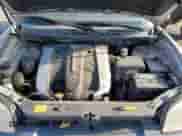 2005 Hyundai Santa Fe GLS z VIN KM8SC73E85U968620, wystawiony jako Copart lot #83382614 z przebiegiem 161 126 mil mil oraz Szkoda całkowita • Salvage title. Historia ofert i sprzedaży dostępna na DreamBid. Obrazek 13.